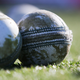 A well-worn cricket ball